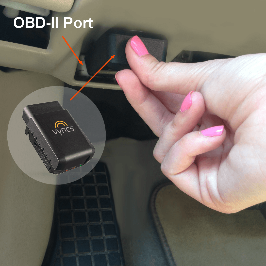A real OBD-II GPS tracking device being installed in a vehicle