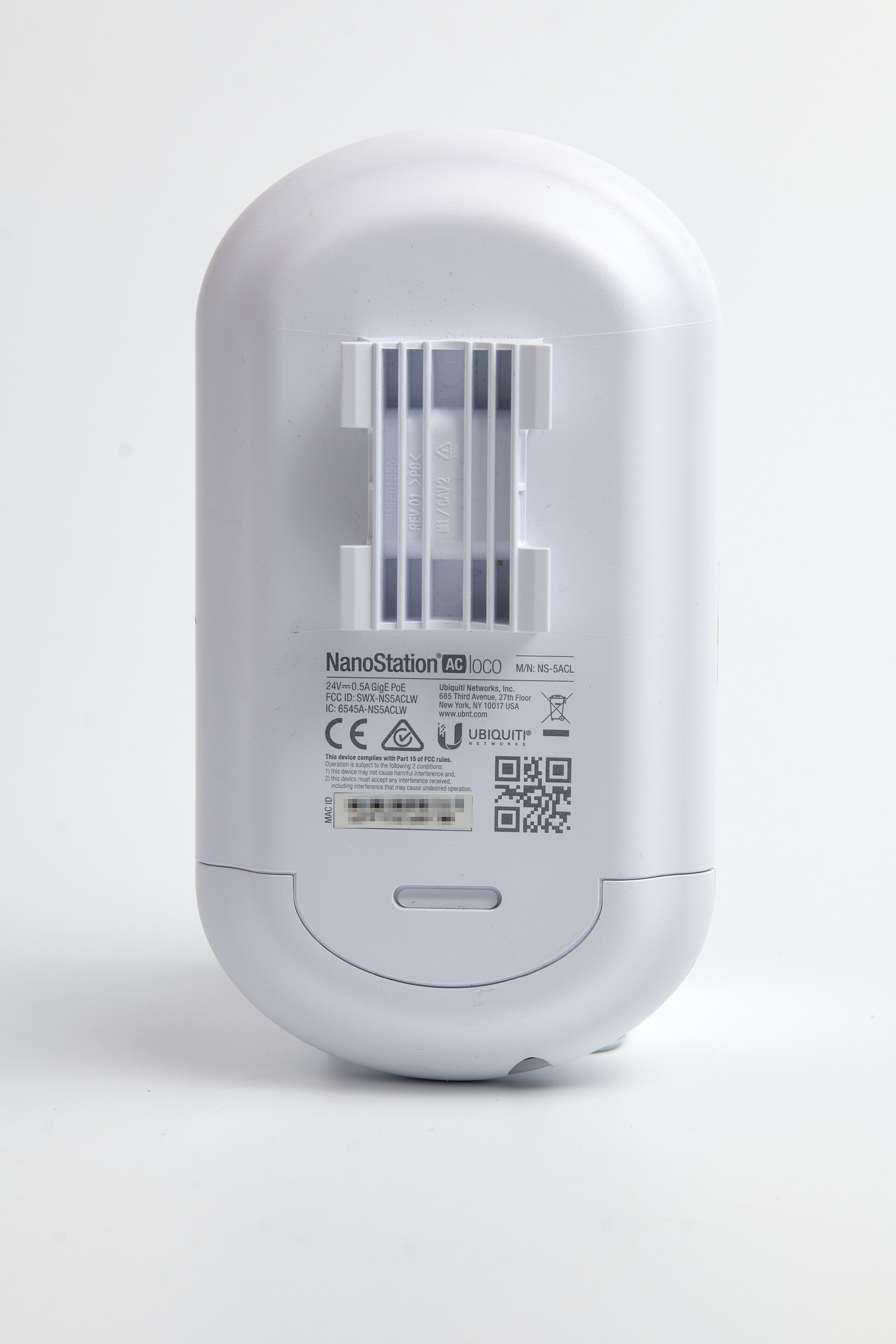 A Ubiquiti NanoStation airMAX wireless device photographed in 2026